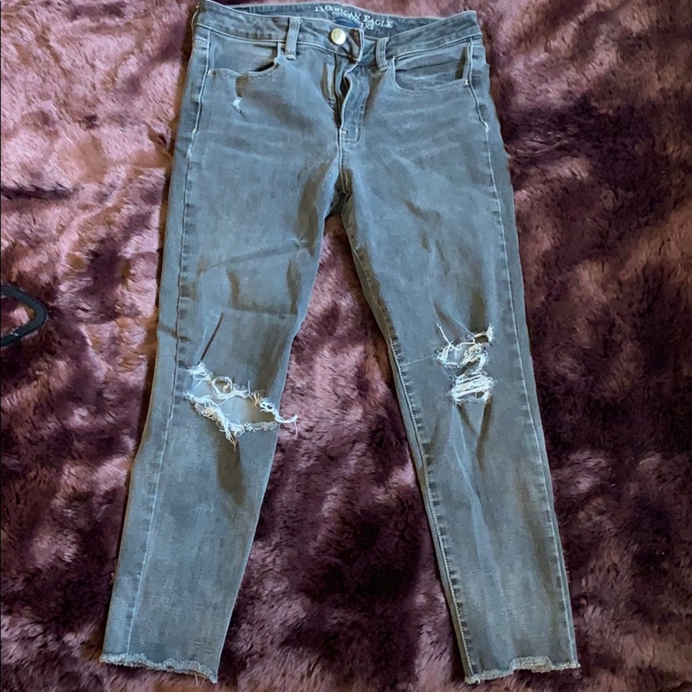 Mid rise black washed out stretch jeans